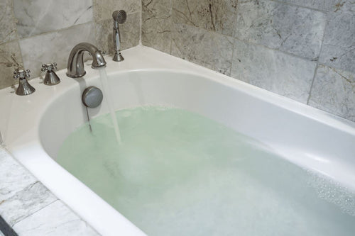Water Coming Up Through Bathtub Drain? Here's Why